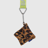 The Baggu Puffy Earbuds Case - Leopard is a stylish pouch made from recycled nylon, attached to a yellow lanyard with a clip, combining style and sustainability.