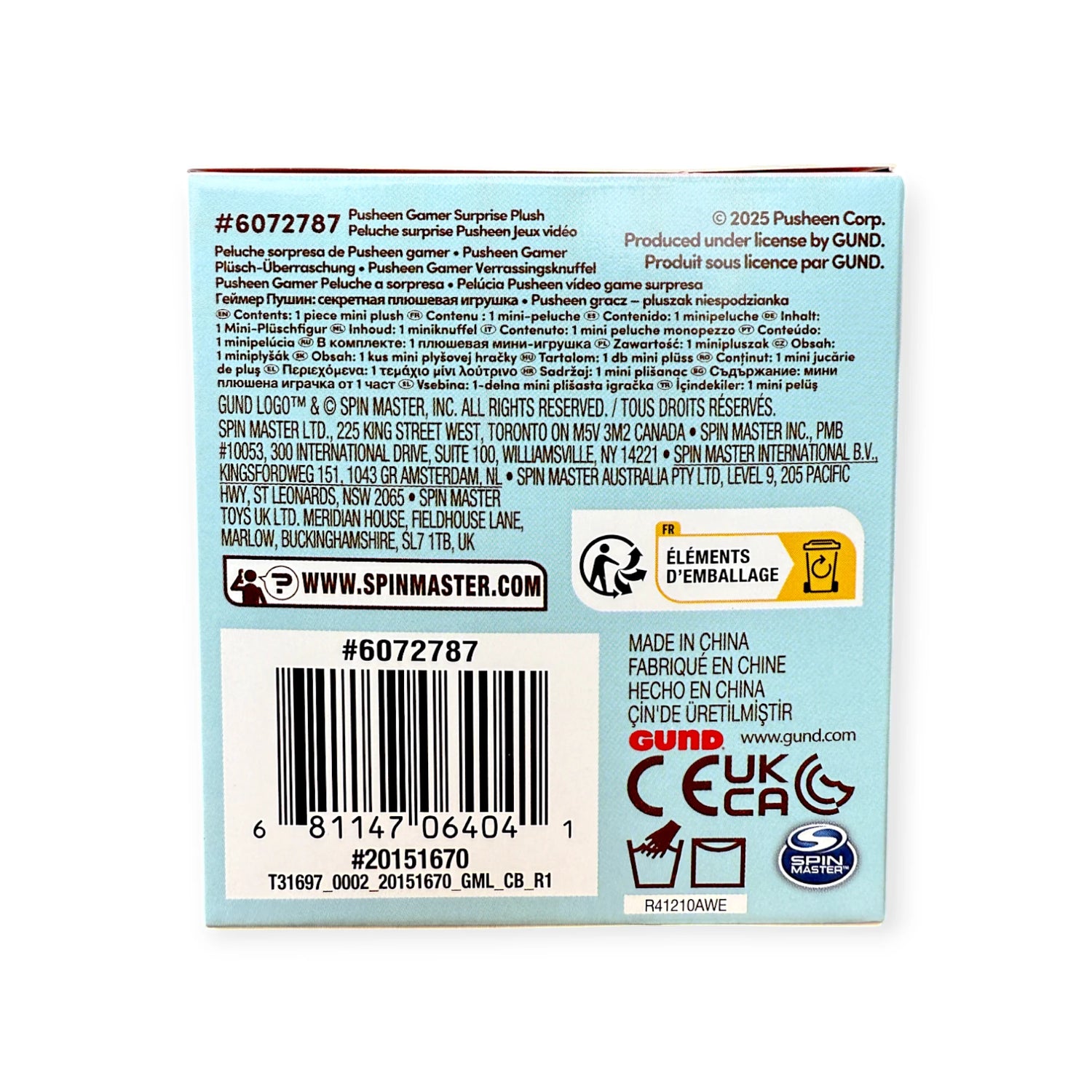 Back of Pusheen Blind Box - Gamer Series plush by Pusheen displays product info, licensing, manufacturing origin, barcodes, and certification logos on a blue background. Includes collectible gamer-themed plush keychains.