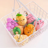 A Pusheen Blind Box - Fruits Series includes a delightful collection of fruity plush toys shaped like grapes, pineapple, and orange, each featuring cute embroidered faces. These charming collectibles are perfect for any fan of Pusheen.