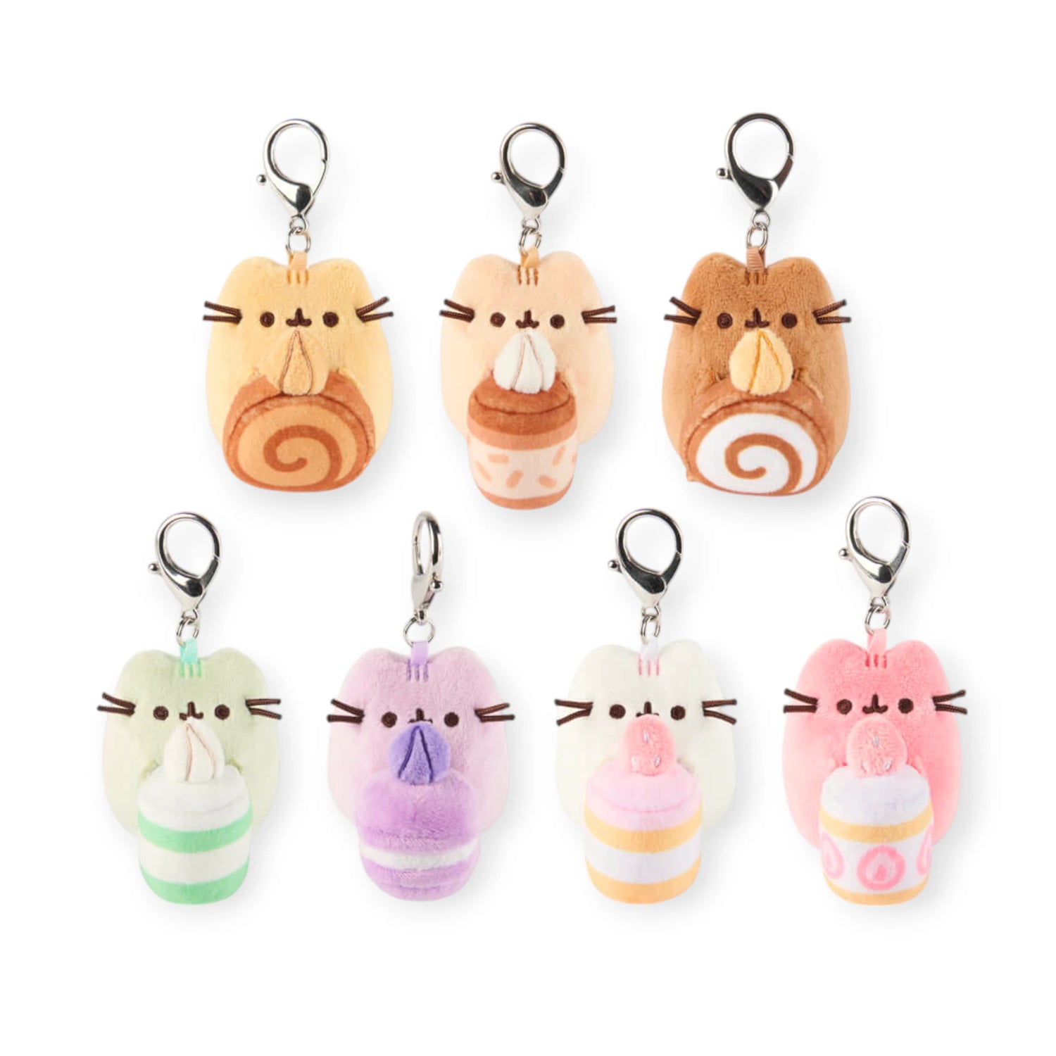 Seven pastel-colored Pusheen Sweets Series Blind Box plush keychains, each a cute cat holding a treat and featuring a metal clasp, are displayed in two rows—perfect for fans of the Pusheen brand.