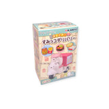 The Re-Ment Sumikko Gurashi Food Delivery Blind Box offers a delightful surprise with its hippo-themed delivery vehicle and an assortment of food items on a light background, capturing the charm of Sumikko Gurashi's world.