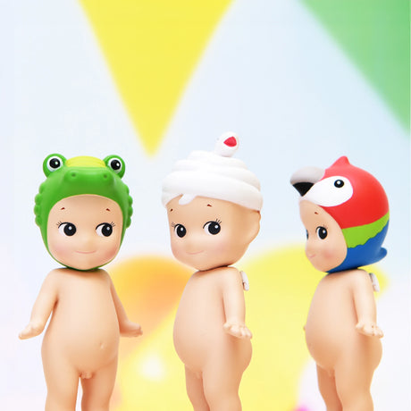 Three figures from the Sonny Angel Animal Version 3 Series, created by Sonny Angel, each donning vibrant, animal-themed hats, stand against a pastel background, capturing the thrill of opening a blind box.