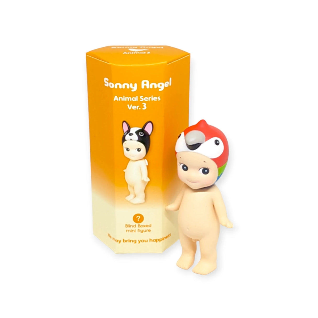 A small figurine with a parrot-themed helmet stands beside its orange packaging, labeled "Sonny Angel Animal Version 3 Series." These delightful collectibles from Sonny Angel come in a blind box, adding an element of surprise to each charming addition.