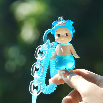 Sonny Angel blue candy store keychain figurine with clear spiral accessory