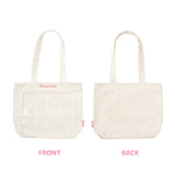 Two canvas Sonny Angel shopping totes are displayed: the front tote bag includes a clear plastic pocket, while the back one is plain. Both feature stylish "Sonny Angel" labels.