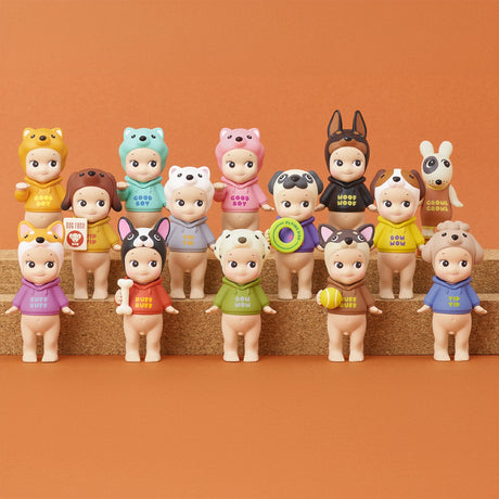 Fourteen figures from the Sonny Angel Dog Time Series by Sonny Angel, each adorned with animal-themed hats and vibrant outfits, are organized in two rows against an orange background. These charming collectible mystery figures beautifully capture a delightful celebration of various dog breeds.