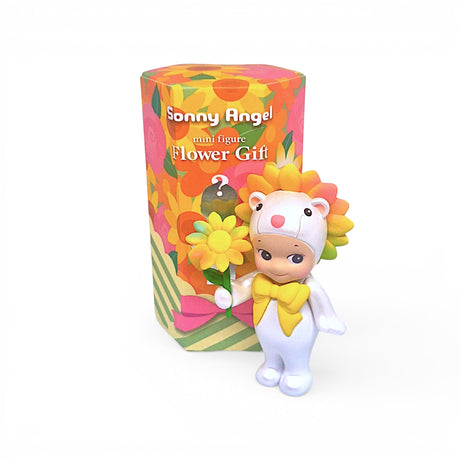 Mini flower gift toy figure with orange flower on head, beside gift box