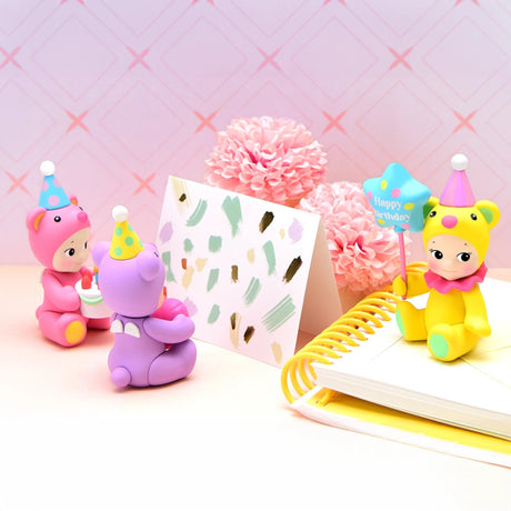 Birthday bear figurines with gift bag, notebook, cake, and 'Happy Birthday' balloon pick