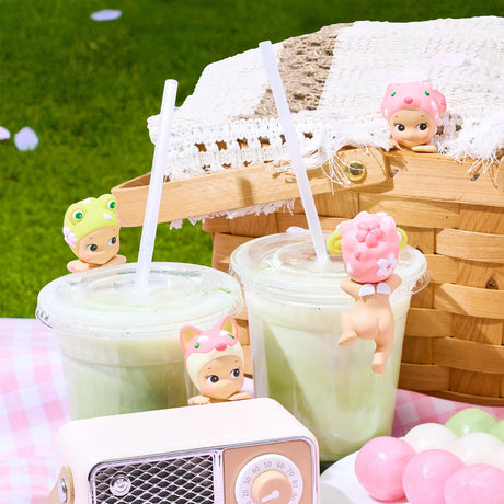 Cherry blossom Hippers mini figures on tray with cups, including pink and green characters
