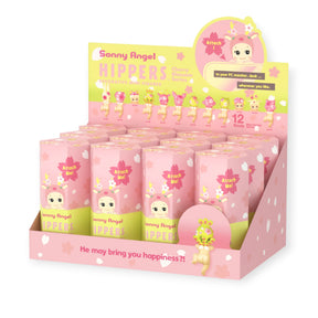 Display of Sonny Angel Cherry Blossom Hippers - Sealed Set of 12 blind boxes with pastel pink and green packaging designs.