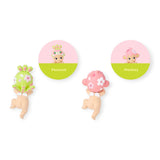 Hippers collectible figures with peacock and monkey designs, pink floral headpieces