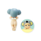 In the Sonny Angel Hippers Blind Box - Animals collection by Sonny Angel, this figurine showcases charming koala ears and angelic wings. The figure is presented from the back and includes a circular image of its cheerful face, along with reusable adhesive for effortless placement on any surface.