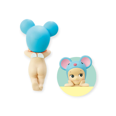 A Sonny Angel Hippers doll from the Sonny Angel Hippers Blind Box - Animals collection is depicted from behind, adorned with a blue mouse hat and angel wings. A circular inset displays the doll's cheerful face, still wearing the hat. You can attach it anywhere using reusable adhesive for an added touch of charm.