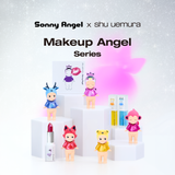 Collection display of Makeup Angel blind box figures on white cubes with boxed items