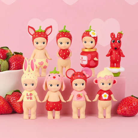 Sonny Angel Strawberry Love Blind Box - Limited Edition featuring strawberry-themed figures by Sonny Angel with pink background and strawberries.