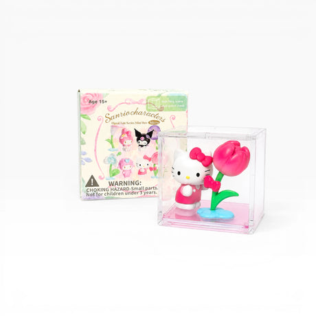 Blind box packaging with Hello Kitty mini figure holding pink rose in clear display