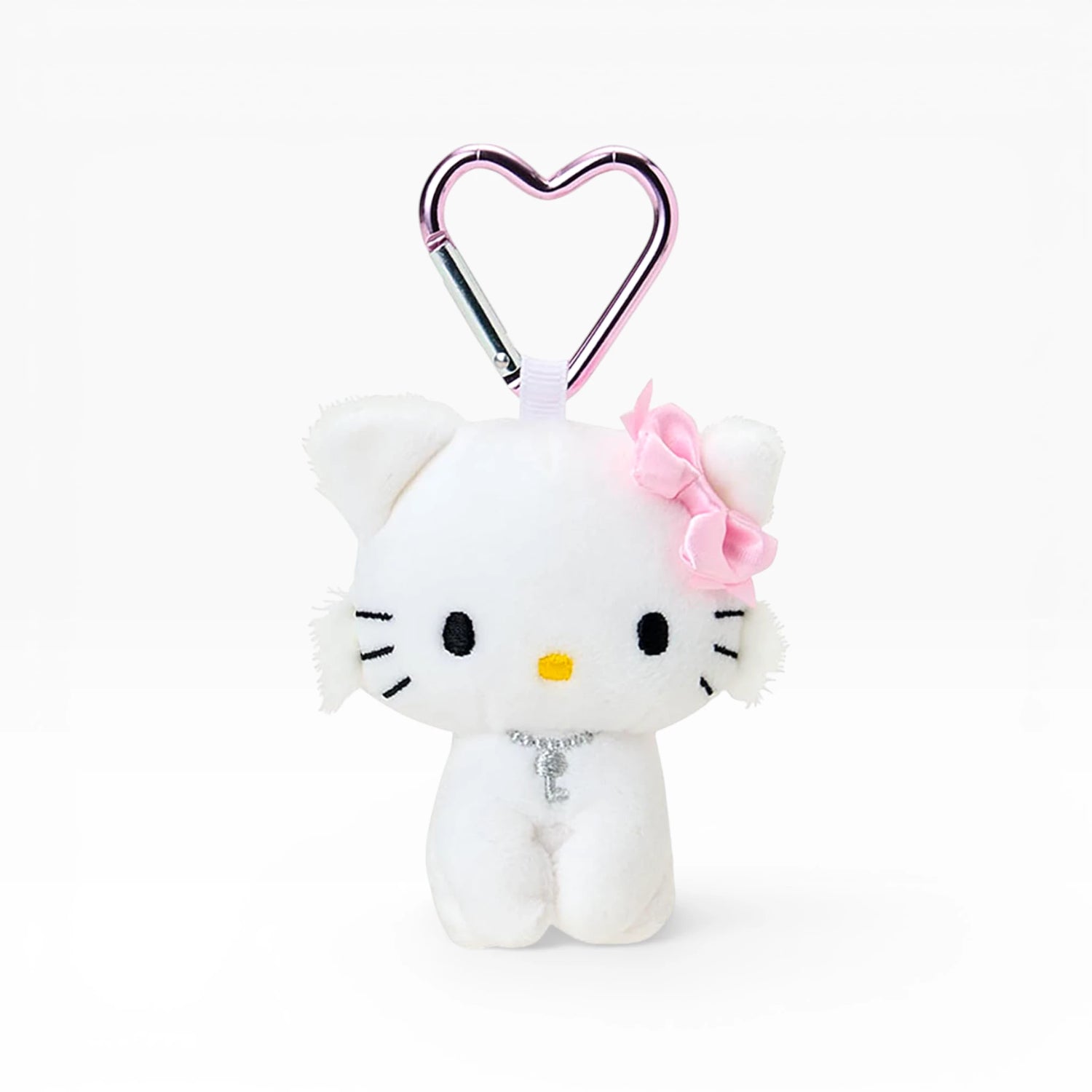 White plush kitty keychain with heart clasp, pink bow, silver charm