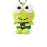 Green plush frog keychain with heart-shaped clasp, close-up face with red bow