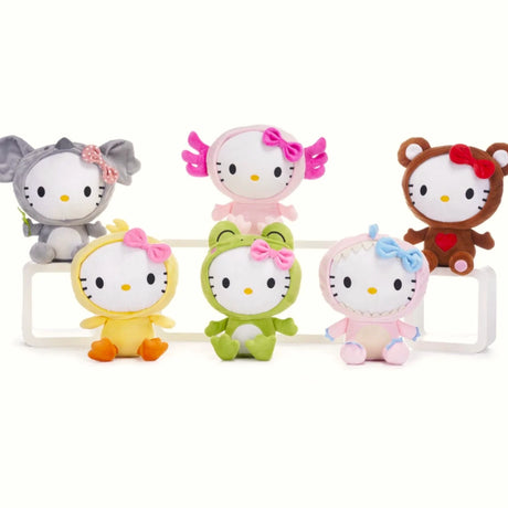 In Kawaii Kingdom, six Hello Kitty plushies don animal costumes—elephant, bird, bear, duck, frog, and pink sheep—and sit on a white surface. Branded as Hello Kitty: Kawaii Kingdom Plushies - 25cm, they're perfect for collectors and plush toy enthusiasts.