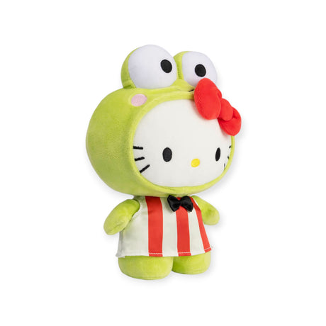 This cute Hello Kitty Plush - Keroppi Costume showcases Hello Kitty dressed in a green costume with large eyes on top and an endearing red bow. It features a white and red striped dress adorned with a black bow tie, making it an ideal addition to any Sanrio favorites collection.