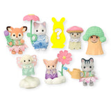 Seven pastel-colored animal figurines from the Sylvanian Families Blind Bag - Blooming Baby Friends collection encircle a silhouette placeholder, featuring charming outfits and accessories like flowers and watering cans. Uncover the surprise in every blind bag!.