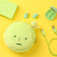 Round plush cushion pouch keychain with light green face, smile and keyring