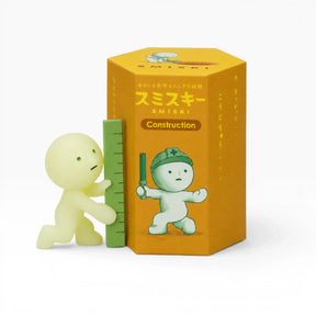 Construction Smiski blind box with figure, tape measure, and building-themed graphics