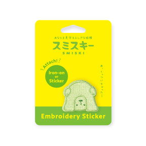 Single pale green Smiski embroidery sticker patch on yellow card for ironing or sticking onto fabric