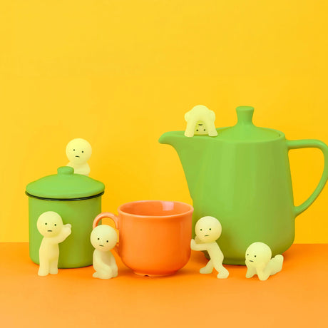 Smiski Series 2 blind box toy figurines with green jar and orange cup
