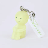 Lime green Smiski strap keychain with metal ring and white hanging tag