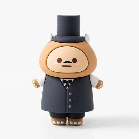 Charming tan character figurine wearing a black top hat, vest with buttons, bow tie, and tiny mustache on white background