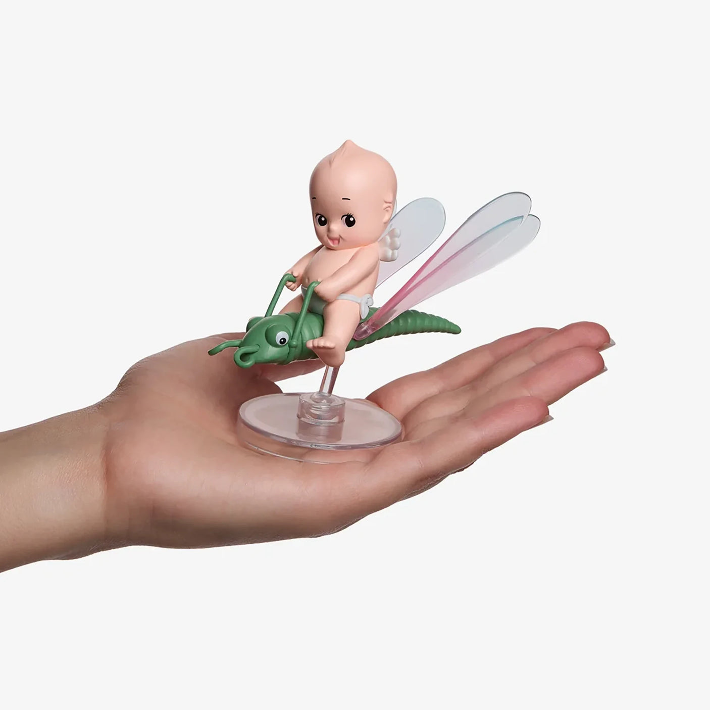 Kewpie blind box figurine: baby on clear stand with wing-like leaves