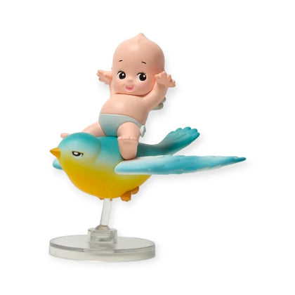 Kewpie and a Bluebird figure from the Kewpie In Nature Lineup