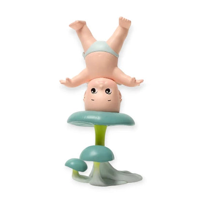 Kewpie Headstands on a Mushroom figure from the Kewpie In Nature Lineup