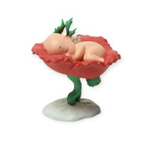 Kewpie blind box figurine: baby lying on red petal base with green sprout details