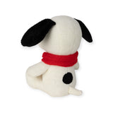 This adorable 17cm Snoopy Scarf Plush by Snoopy, crafted from recycled polyester, features a white dog with black ears and a black spot on its back, donning a red scarf while sitting gracefully and facing away.