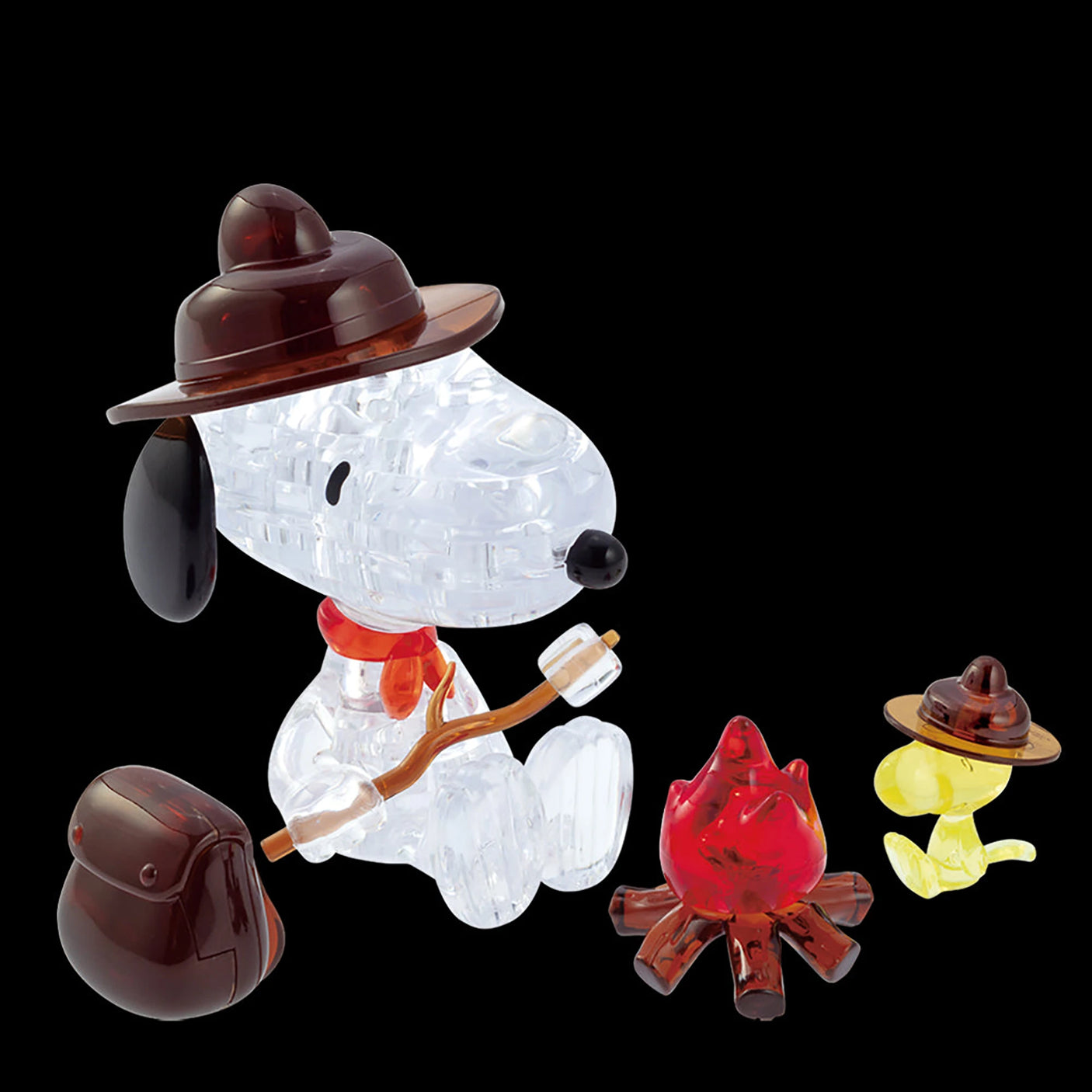 The Snoopy Camp 3D Crystal Puzzle features crystal figurines of a dog and bird in hats enjoying a camping moment by the glow of an LED campfire. The dog playfully holds a stick with a marshmallow, embodying delightful charm.