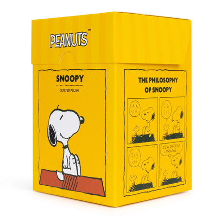 Ideal for any Peanuts enthusiast, the Snoopy Quilted Plush in Gift Box – 17cm features a delightful yellow box with a charming quilted Snoopy design and classic comic strips. This eco-friendly product brings timeless joy under the title "The Philosophy of Snoopy.