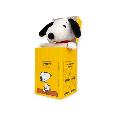 Discover the eco-friendly comfort of the Snoopy Quilted Plush in Gift Box – 17cm. Presented in an open yellow box featuring colorful Peanuts comic strip artwork, this plush toy is an ideal keepsake for any Peanuts enthusiast who cherishes both nostalgia and coziness.