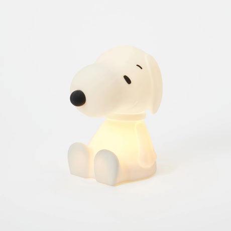 An 11cm Snoopy Night Light by the brand Snoopy, crafted from BPA-free silicone and shaped like the beloved Peanuts character, sits against a white background.