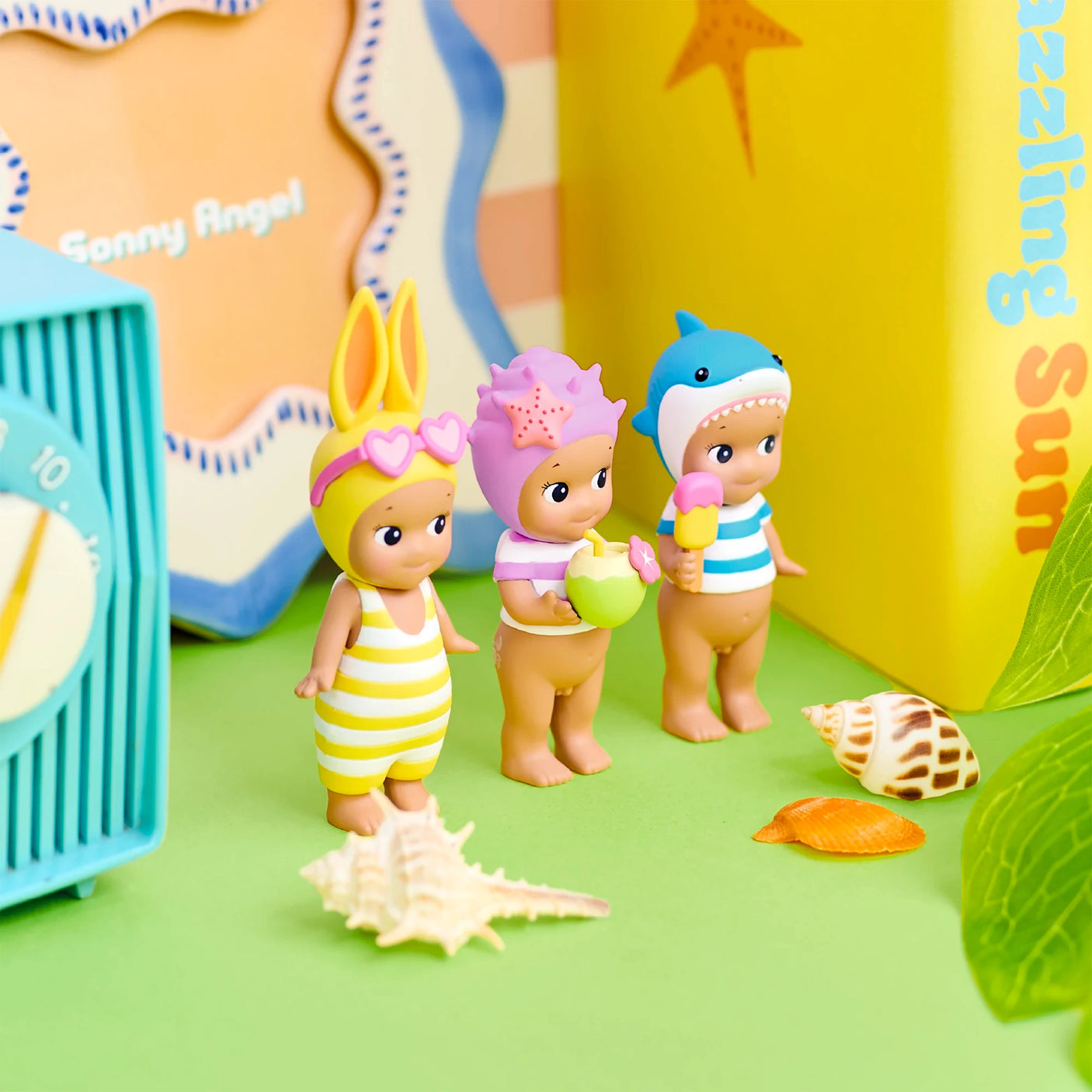 Sonny Angel Summer Vacation Sun Kissed figures gathered outdoors in striped swimsuits
