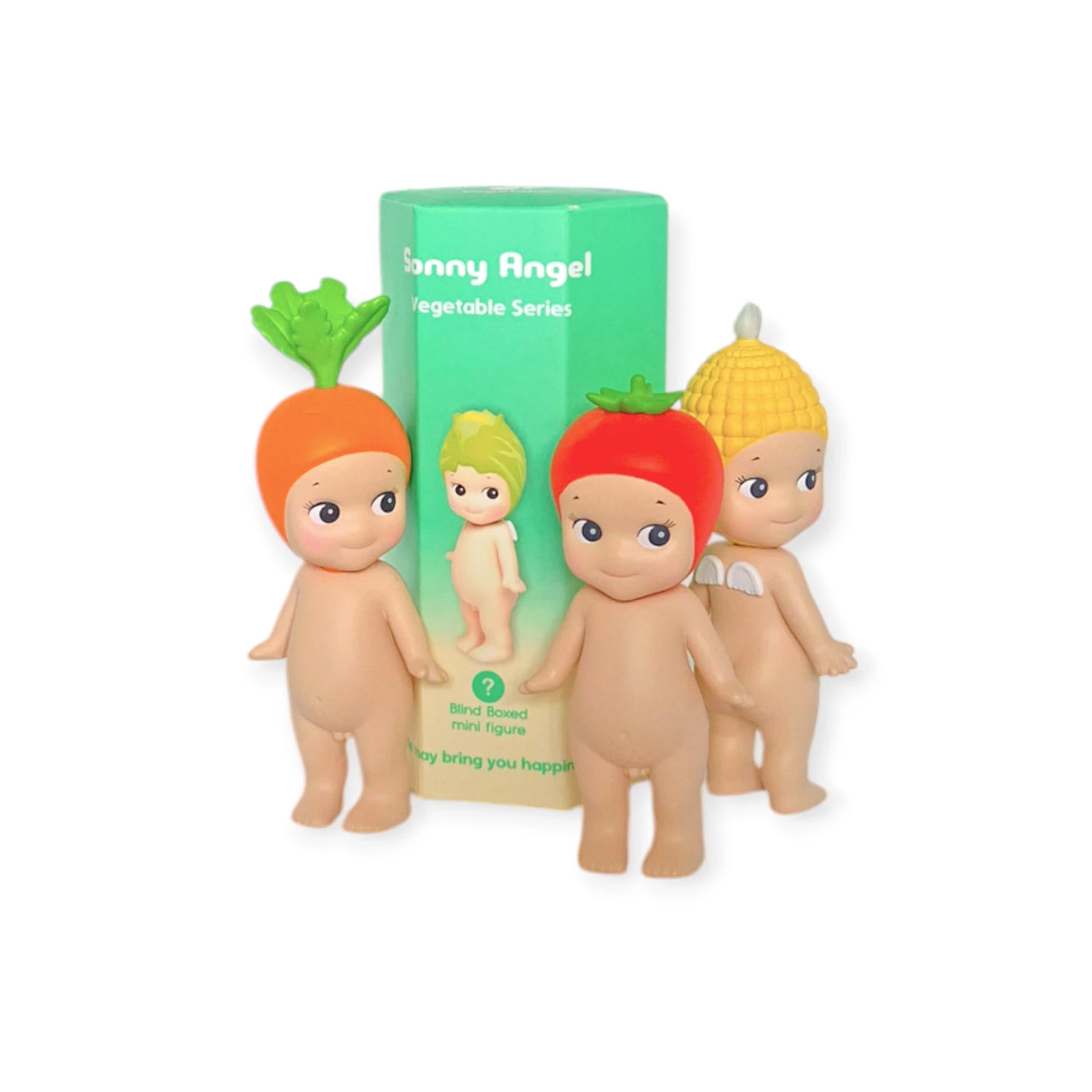 Three cute figurines wearing hats inspired by vegetables are positioned in front of a green box with the label "Sonny Angel Vegetable Series Blind Box." These charming characters are concealed within a blind box by Sonny Angel, bringing an exciting surprise element to your collection.