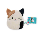 The Squishmallows Calico Cat Plush Case by Squishmallows is a delightful, cat-shaped pouch adorned with tan, white, and black patches and a winking face. It comes with a vibrant label featuring animated animal designs.