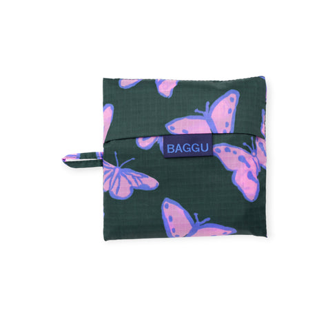 Folded dark green pouch with purple and pink butterfly designs and blue BAGGU label on white background