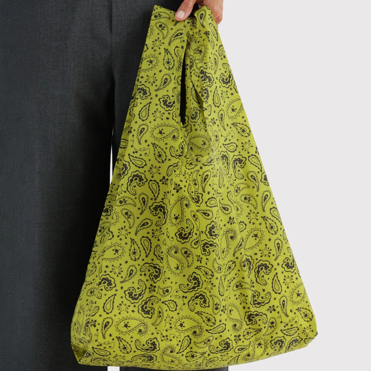 Held chartreuse paisley reusable tote bag with patterned fabric and gathered top