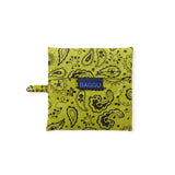 Folded paisley reusable tote bag in chartreuse with BaggU logo label