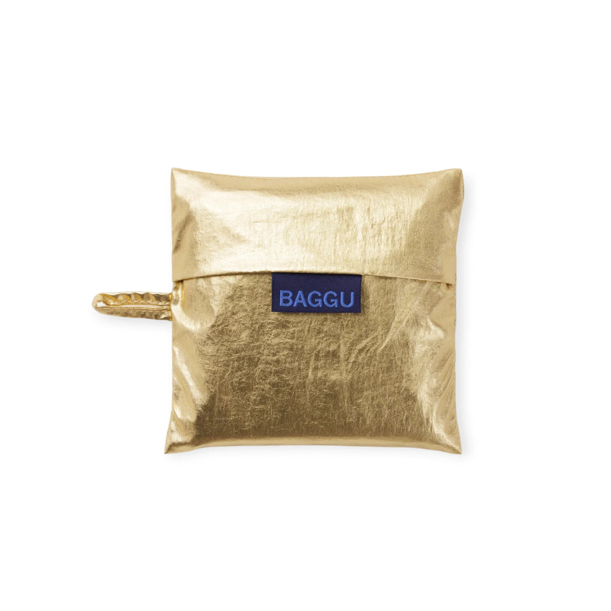 Folded metallic gold Baggu tote pouch with blue logo patch
