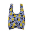 Reusable tote bag with yellow pear and black star pattern