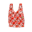 The Baggu Standard Bag - Hello Kitty Apple by Baggu is a pink reusable bag adorned with charming strawberry and apple patterns, made from eco-friendly recycled materials.