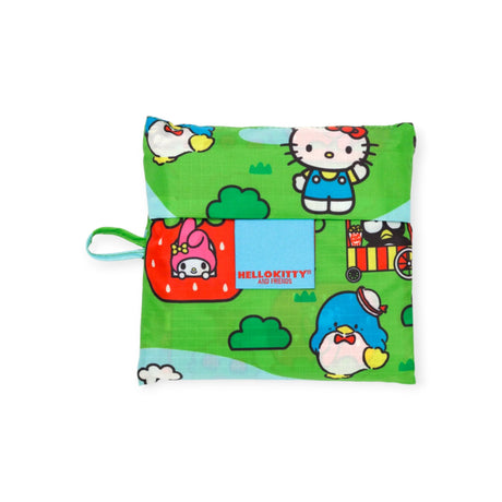 Introducing the Baggu Standard Bag - Hello Kitty Scene, a vibrant pouch crafted from recycled polyester by Baggu. It showcases Hello Kitty and other beloved cartoon characters set against a green backdrop, and includes a convenient small handle on one side.